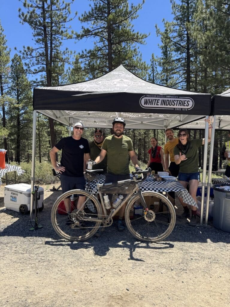 Alec White rides to the Lost and Found White Industries Aid Station #2. 